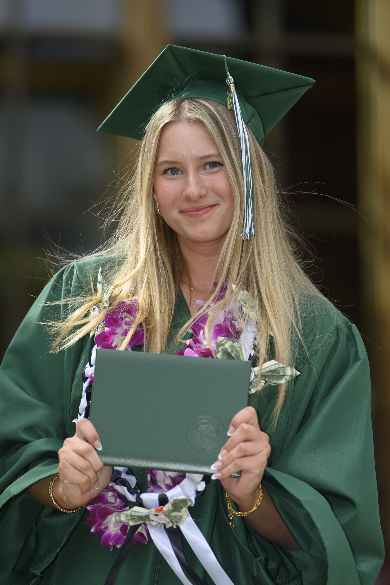 Graduate in cap and gown